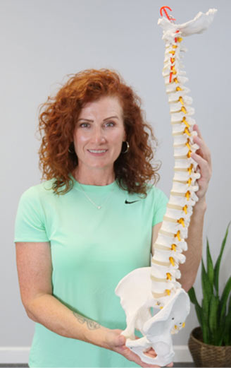 Tonya presenting a full size model of the spine