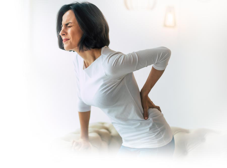 Image of a woman suffering from excruciating back pain